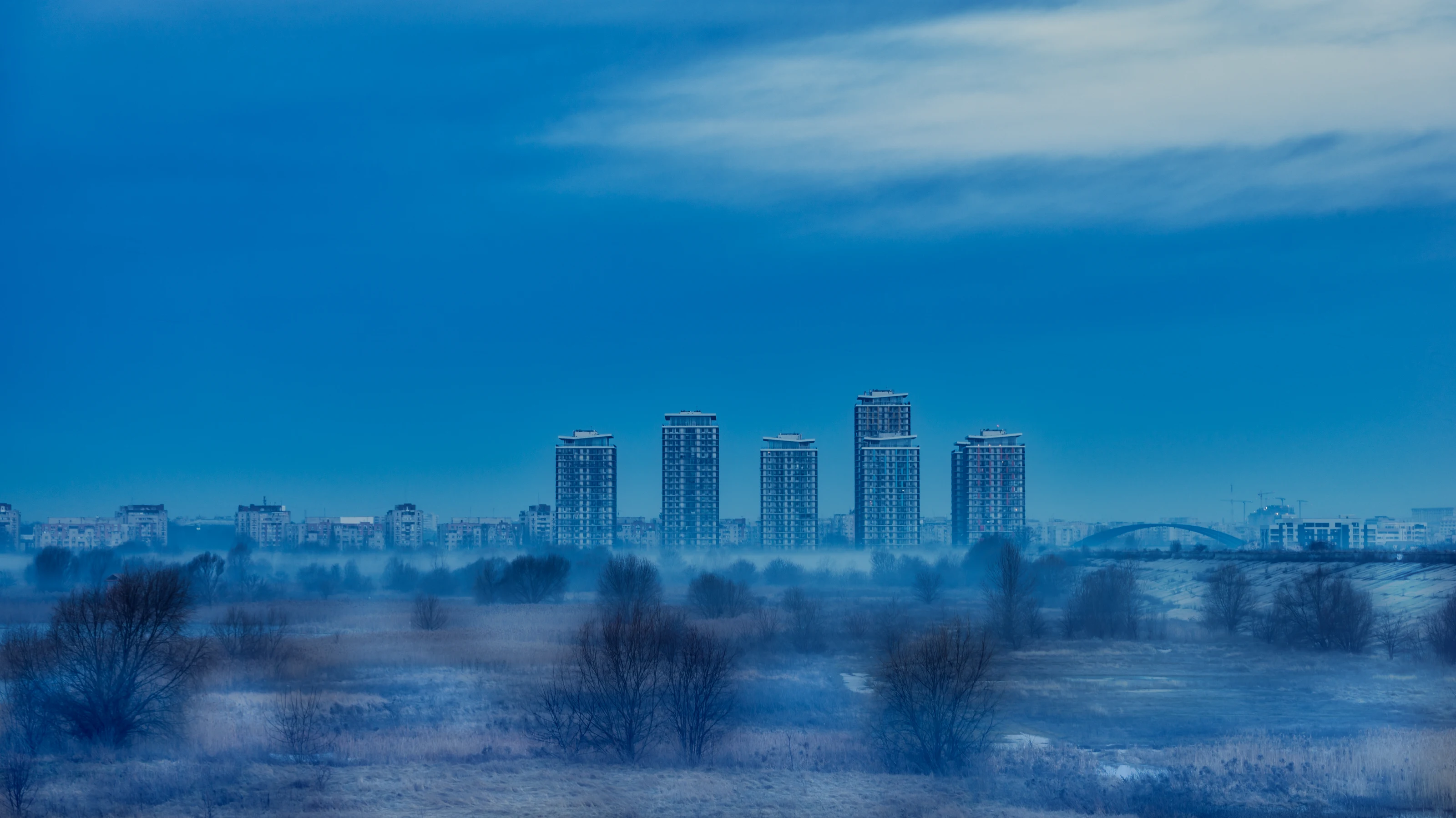 Bucharest residential skyline beside Vacaresti urban nature reserve